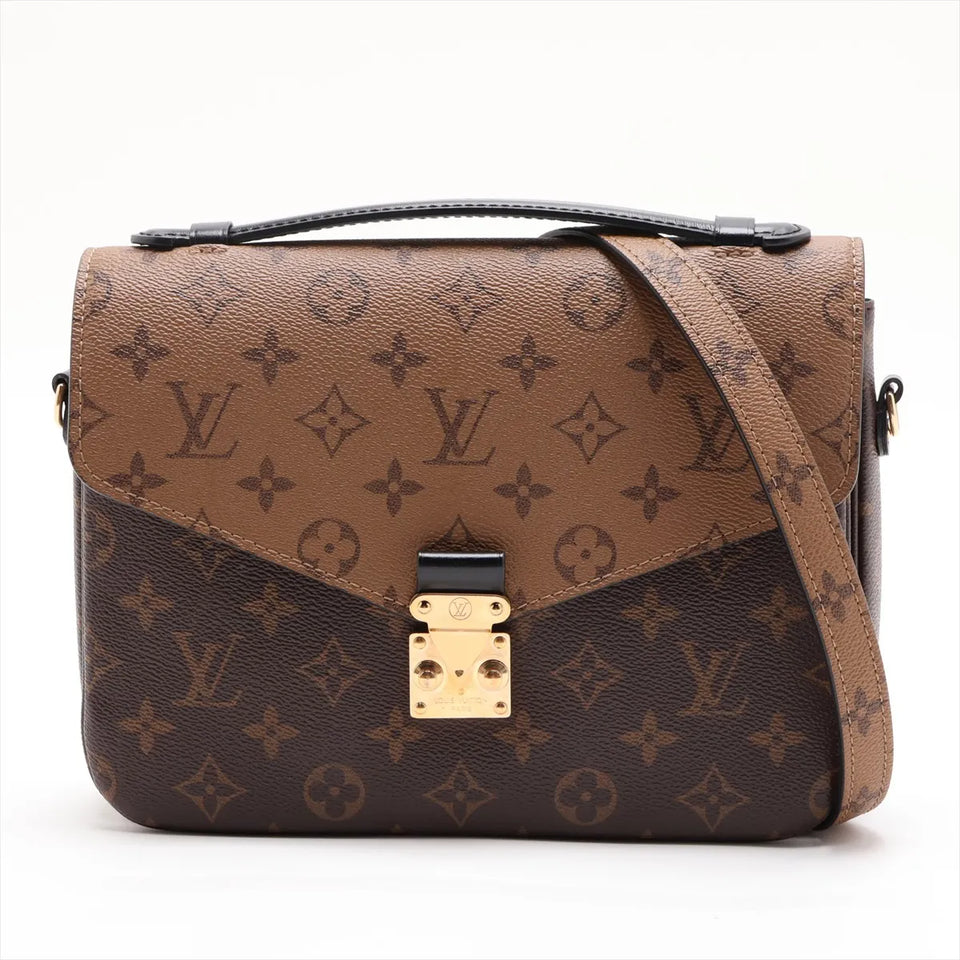 Louis Vuitton Pochette Métis MM i Monogram Reverse canvas med skulderrem, set forfra