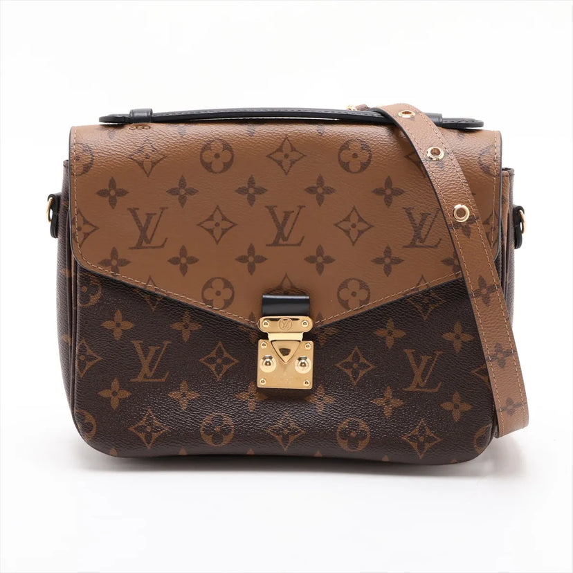 Louis Vuitton Pochette Métis MM i Monogram Reverse canvas med skulderrem, set forfra